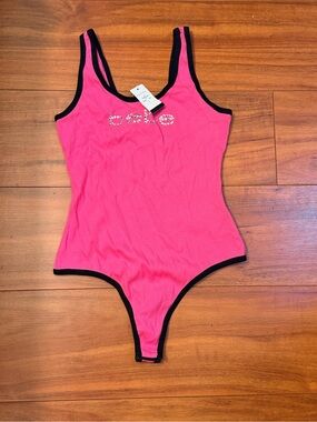bebe Hot Pink Rhinestone Logo Bodysuit with Black Trim